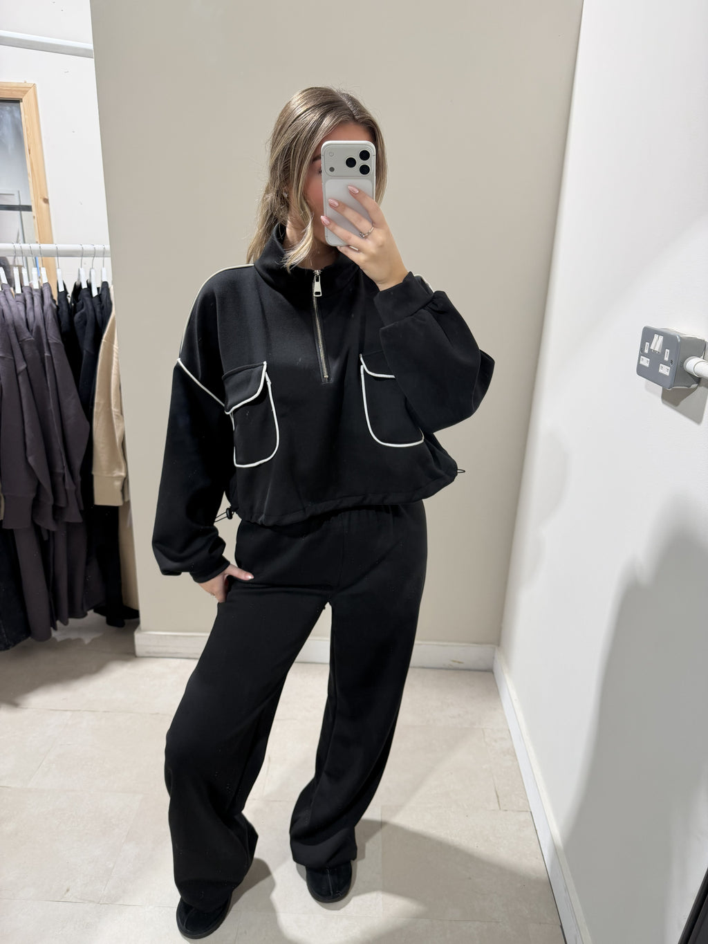 Black contrast-piped half-zip top and matching trousers