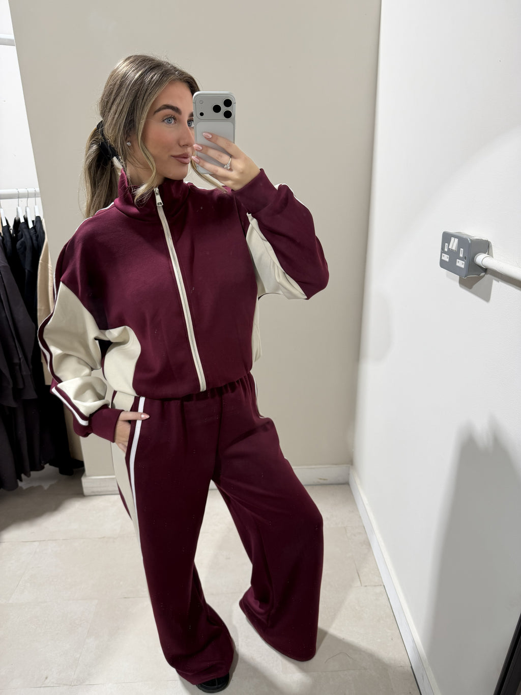 Burgundy and cream zip-front top and wide-leg trousers