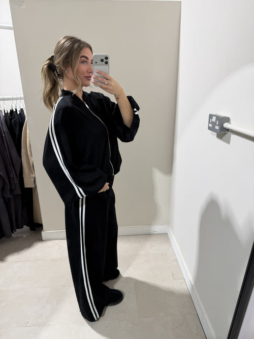 Black side-stripe top and wide-leg trouser set side view
