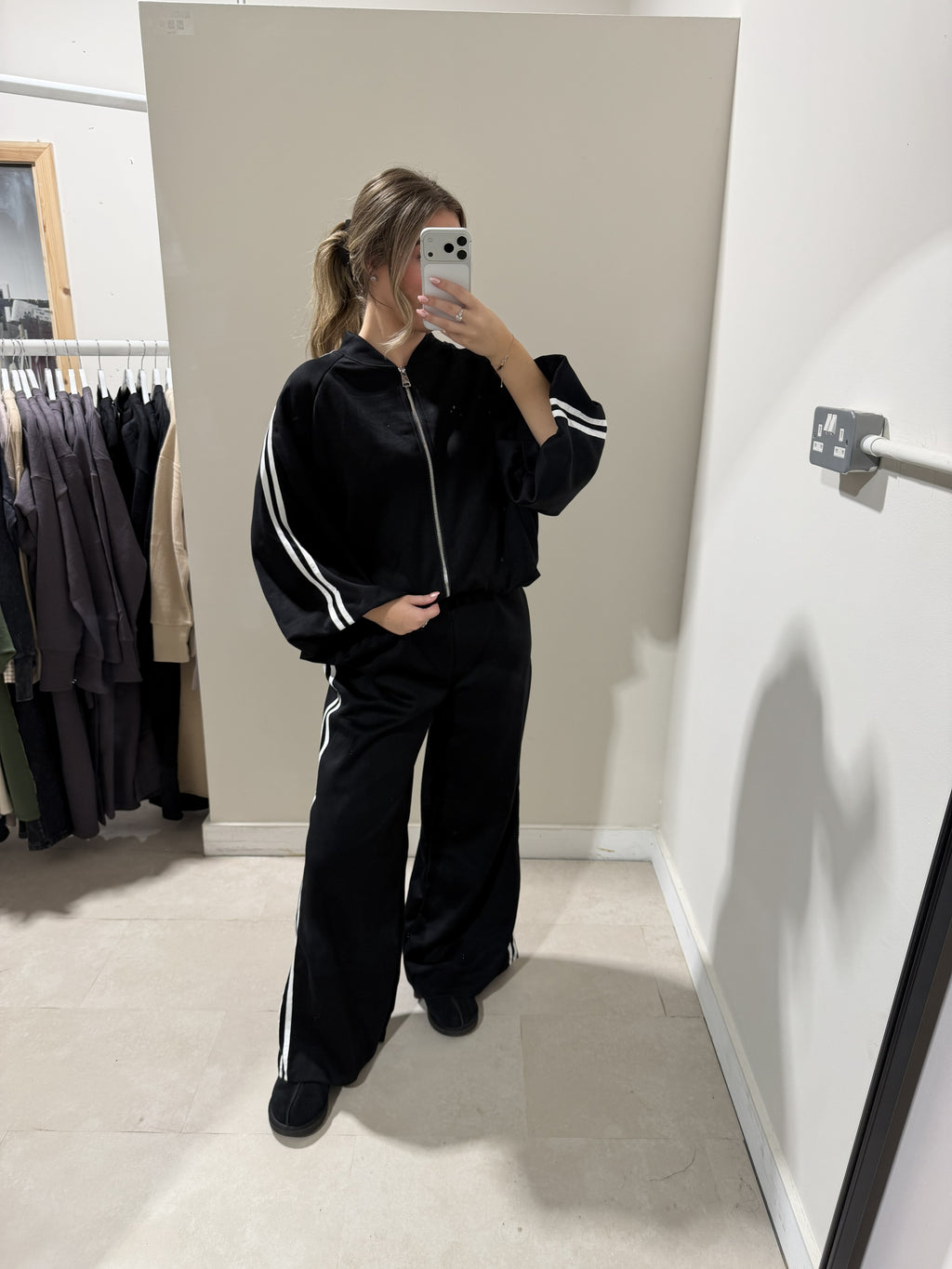 Black side-stripe loungewear set full-length view