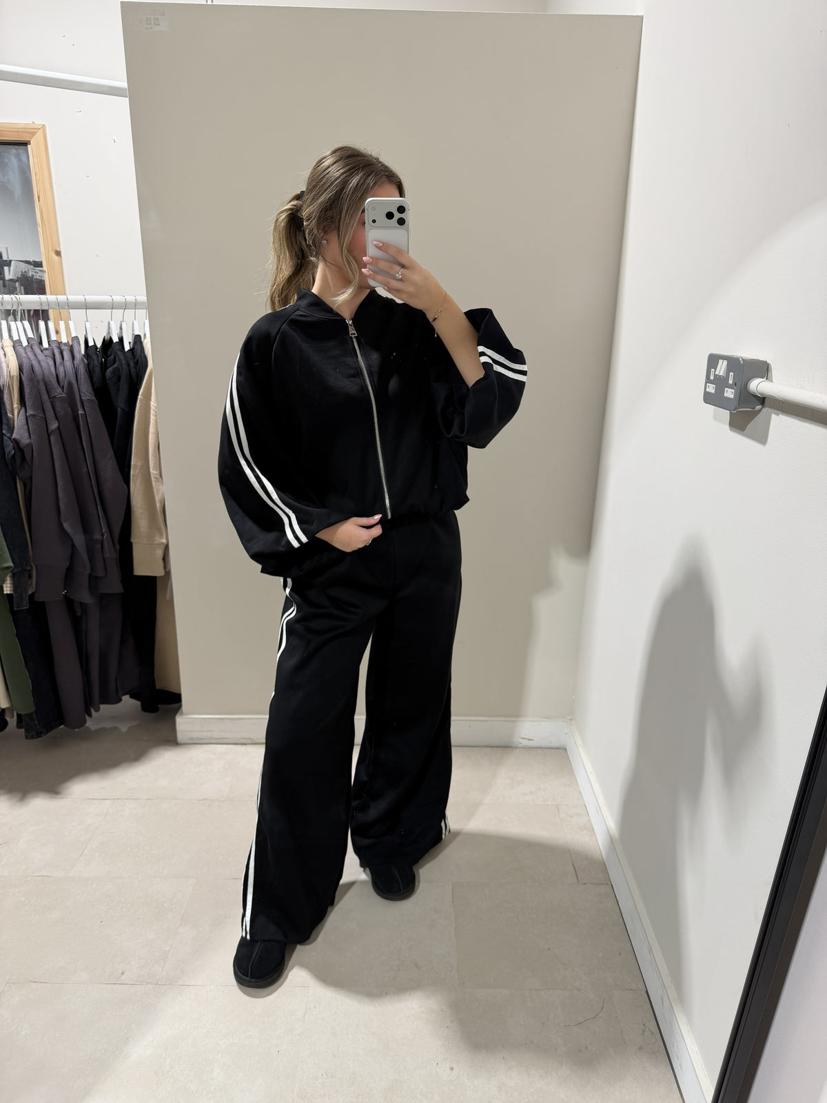 Black side-stripe loungewear set full-length view